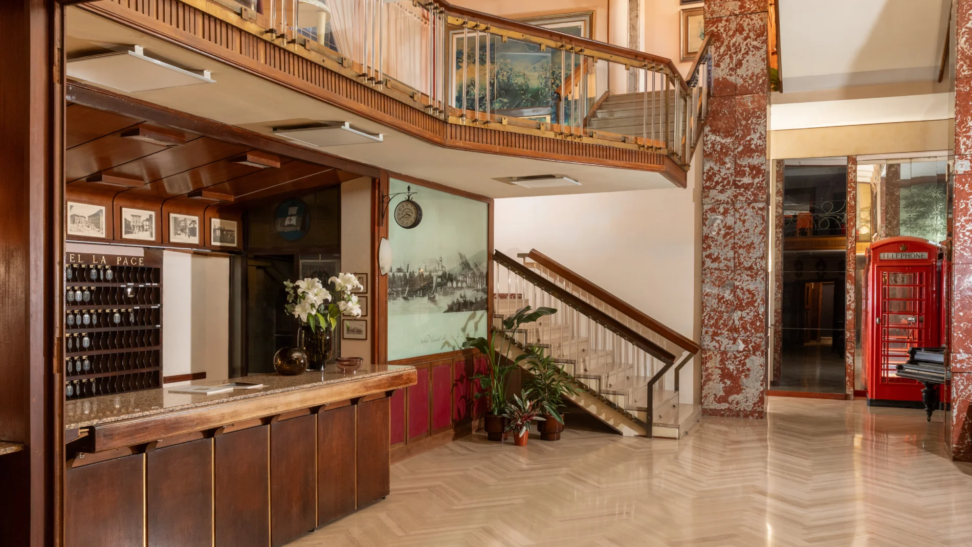 Elegant hotel lobby with staircase, vintage details and welcoming common areas in Pisa city center - Hotel La Pace, BZAR hotels in Pisa